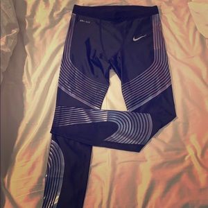 Men’s Nike compression tights with blue trim